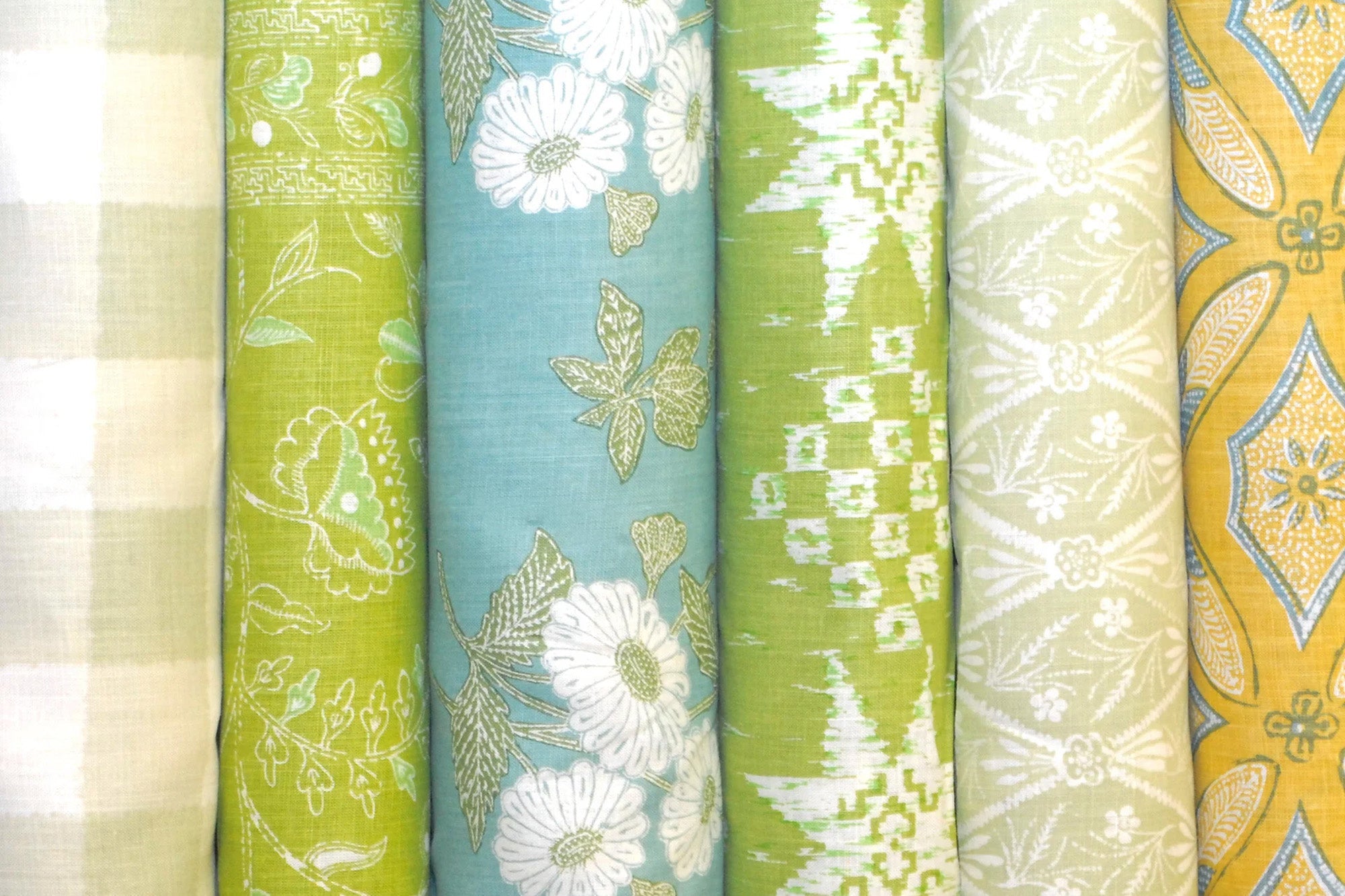 Rolls of Batik Fabric by Kathryn M. Ireland