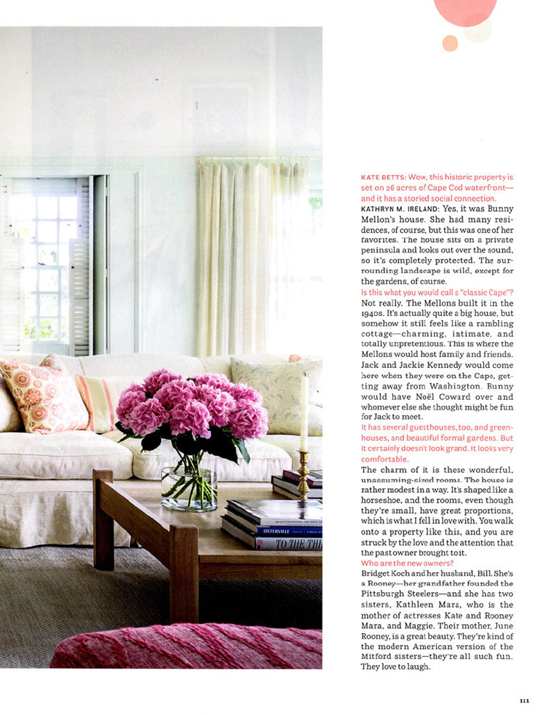 A page in House Beautiful magazine featuring a living room in a Cape Cod home designed by Kathryn M. Ireland