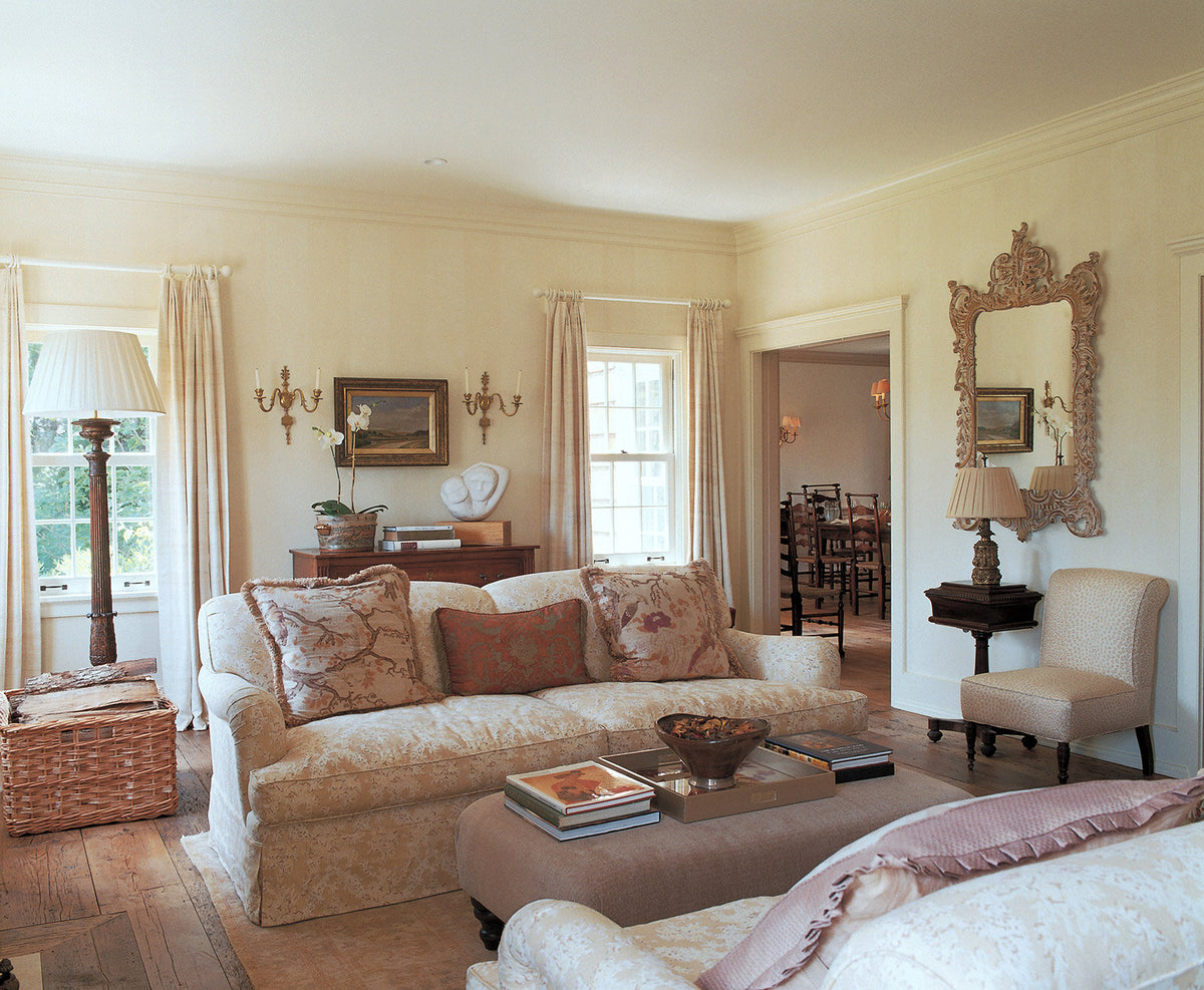 A classic living room featuring sofas in Ikat Yellow designed by Kathrn M. Ireland