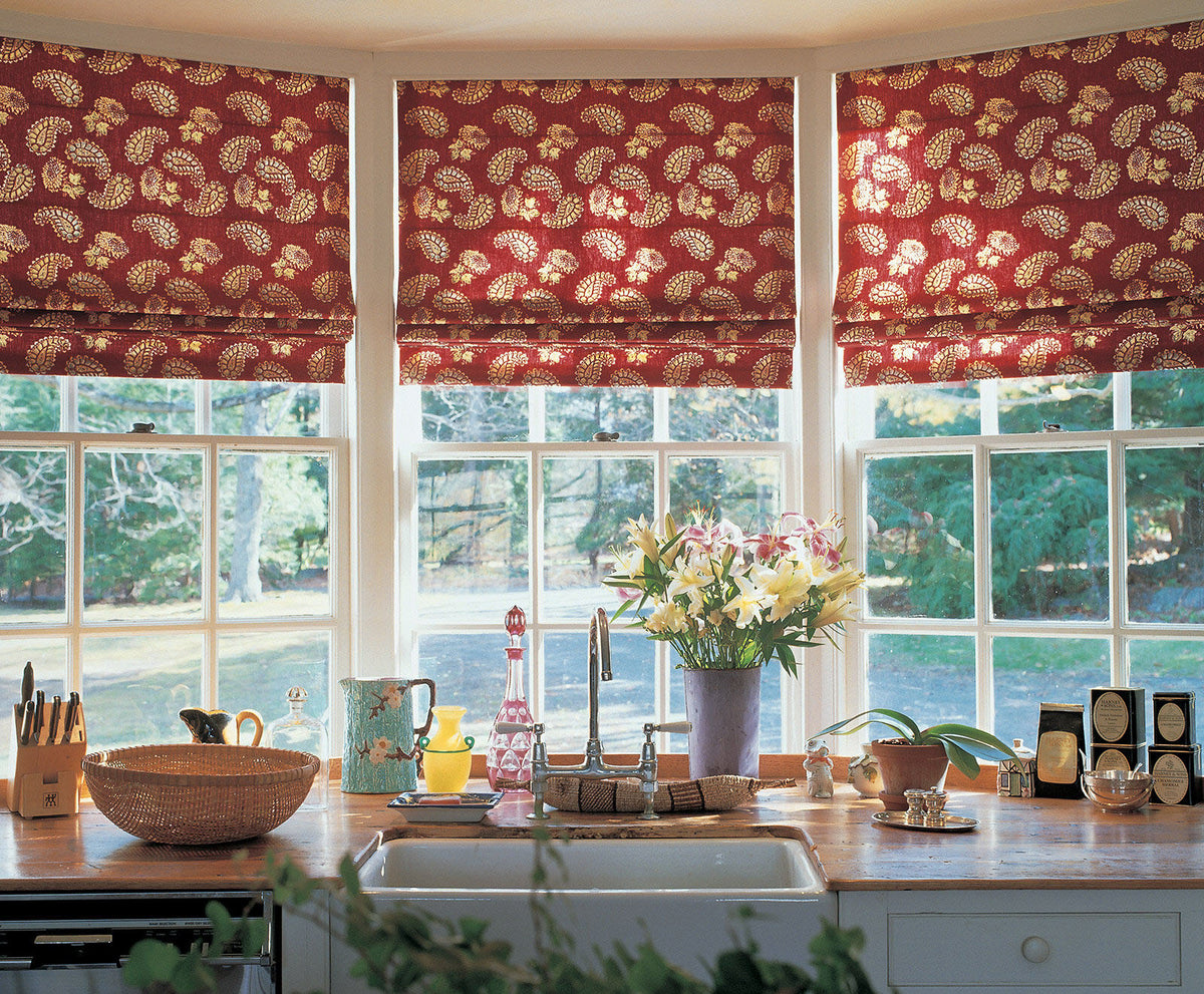 Three roman shades in Quilt Red designed by Kathryn M. Ireland
