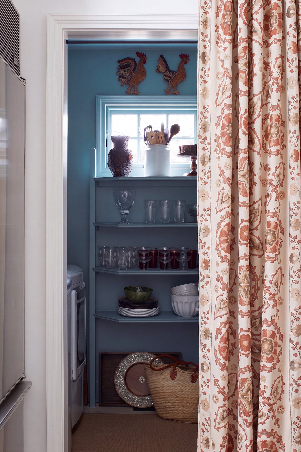 Sultan Suzani Sienna curtains in a kitchen/pantry area designed by Kathryn M. Ireland